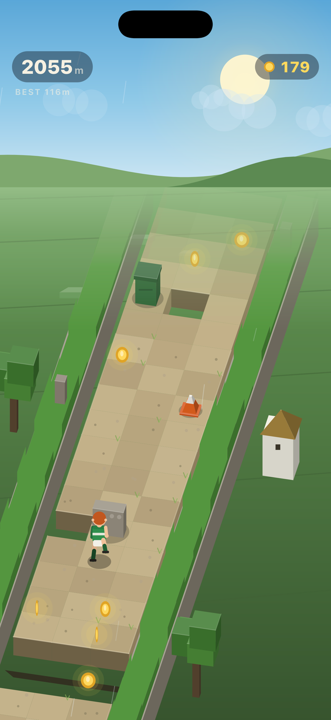 The lad running down a sunny country boreen past a stone wall, a green bin, a traffic cone and a whitewashed cottage
